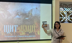 Директорка музею Тетяна Зоць відкриває презентацію