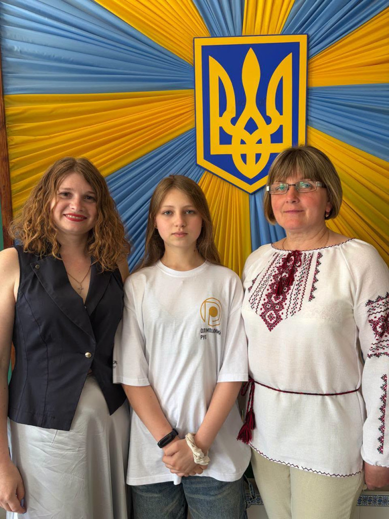 випускниця з вчительками