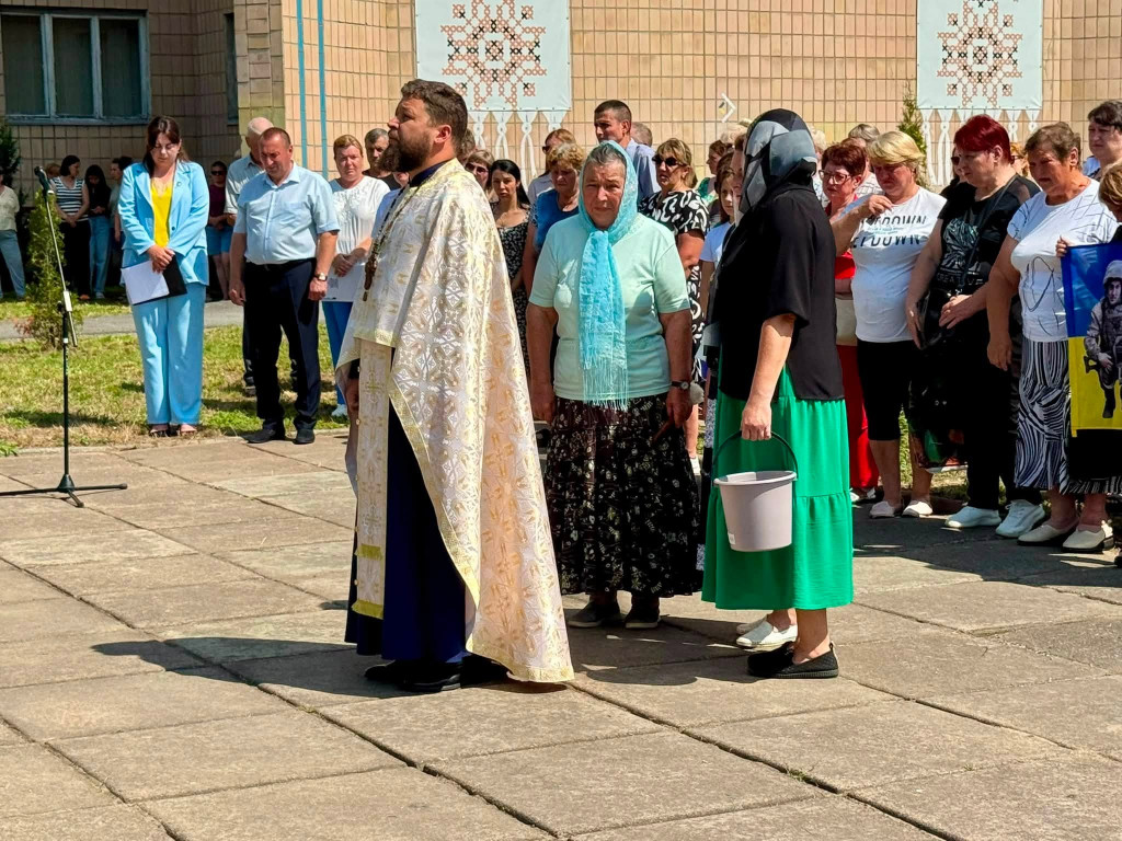 священник
